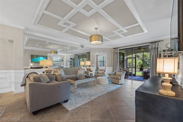 living room with crown molding, coffered ceiling, tile patterned floors, and ceiling fan