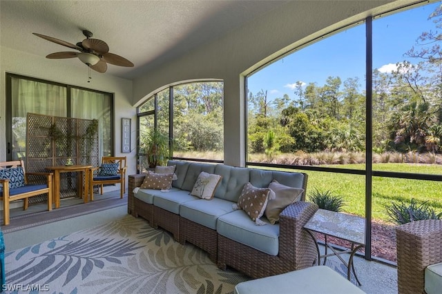 sunroom / solarium with ceiling fan