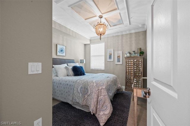 bedroom with ornamental molding, carpet floors, and an inviting chandelier