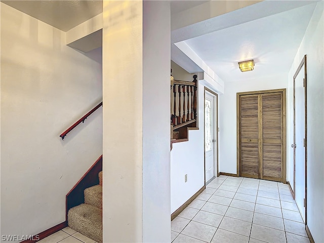 view of tiled foyer entrance