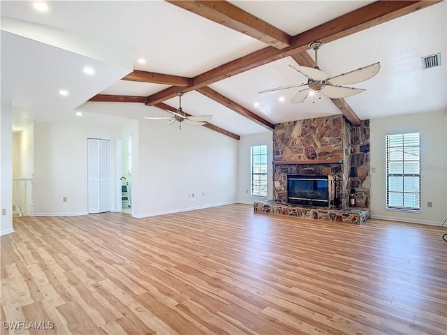 24313 Pirate Harbor Blvd, Punta Gorda, FL 33955 - unfurnished living room featuring vaulted ceiling with beams, visible vents, light wood-style floors, and ceiling fan