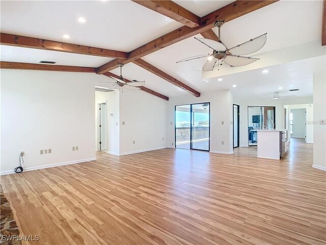24313 Pirate Harbor Blvd, Punta Gorda, FL 33955 - unfurnished living room with baseboards, a ceiling fan, light wood-type flooring, and recessed lighting