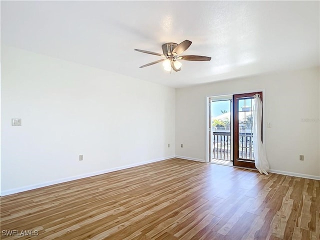 24313 Pirate Harbor Blvd, Punta Gorda, FL 33955 - empty room with ceiling fan, baseboards, and light wood-type flooring