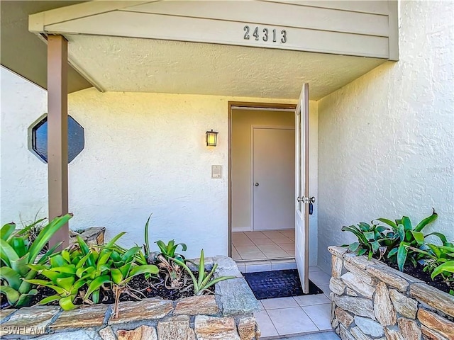 24313 Pirate Harbor Blvd, Punta Gorda, FL 33955 - entrance to property featuring stucco siding