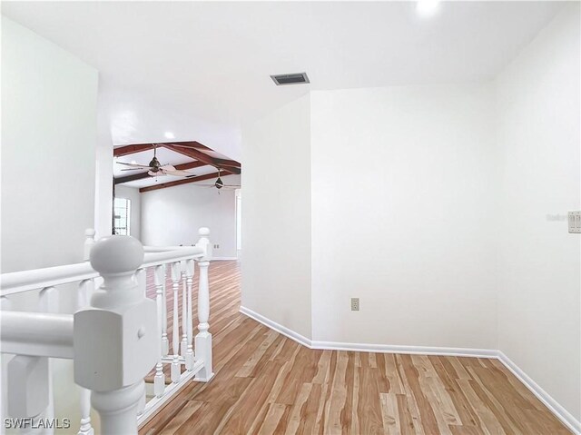 24313 Pirate Harbor Blvd, Punta Gorda, FL 33955 - hall with wood finished floors, baseboards, beam ceiling, visible vents, and recessed lighting