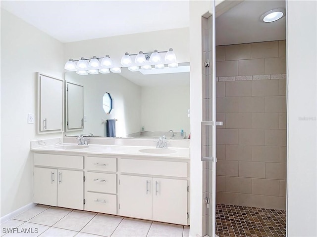 24313 Pirate Harbor Blvd, Punta Gorda, FL 33955 - full bathroom with double vanity, tile patterned floors, a stall shower, and a sink