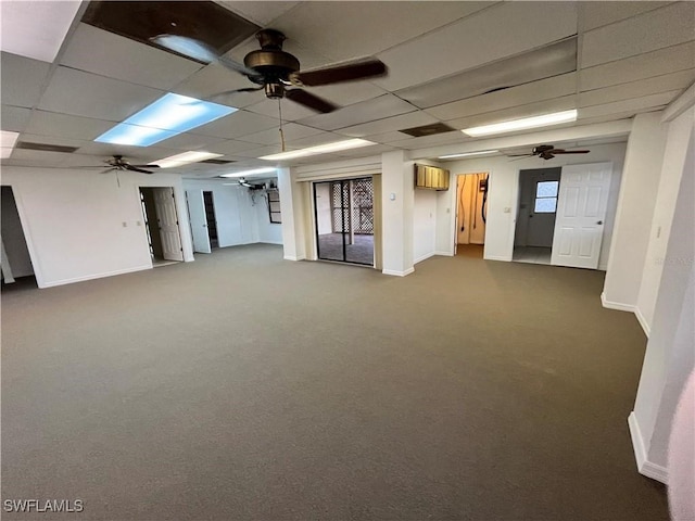24313 Pirate Harbor Blvd, Punta Gorda, FL 33955 - below grade area with baseboards, dark carpet, and ceiling fan