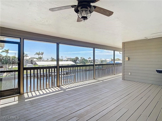 24313 Pirate Harbor Blvd, Punta Gorda, FL 33955 - deck featuring a ceiling fan and a water view