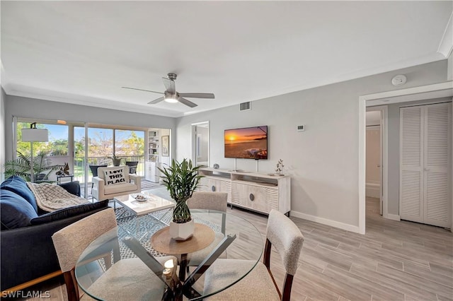 dining area featuring ceiling fan and light wood-type flooring