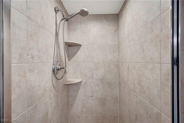 room details with a tile shower