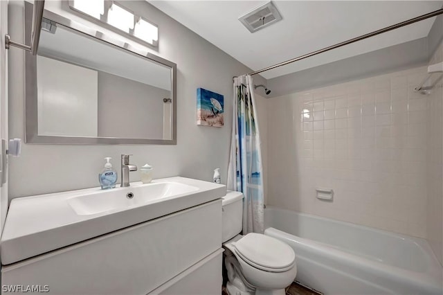 full bathroom featuring vanity, toilet, and shower / bath combo