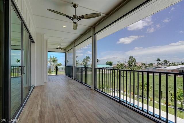 balcony featuring ceiling fan