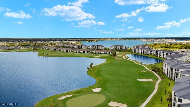 drone / aerial view with a water view