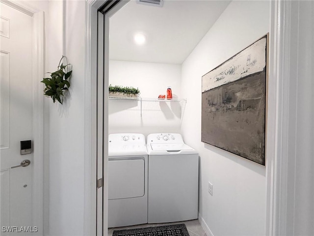 laundry room featuring washer and dryer