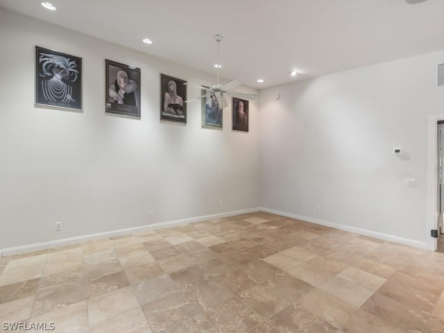 spare room with ceiling fan