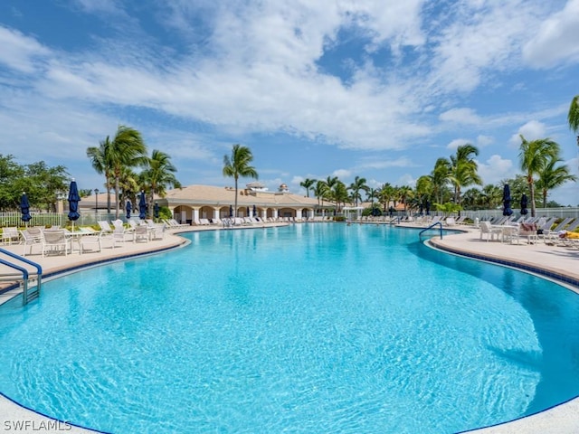 view of swimming pool featuring a patio