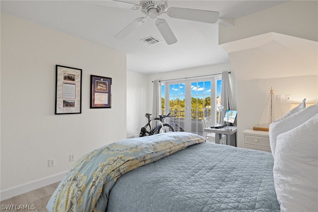 bedroom with ceiling fan and light hardwood / wood-style flooring