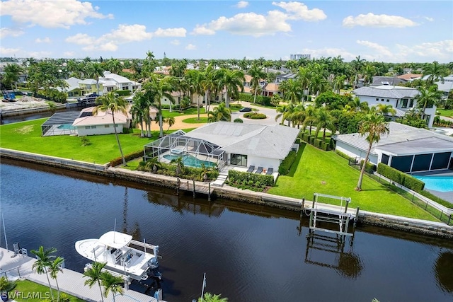 drone / aerial view featuring a water view