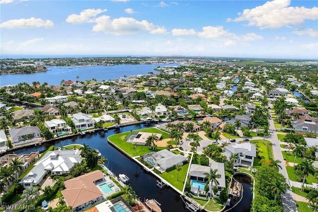 drone / aerial view with a water view