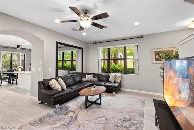 living room featuring ceiling fan