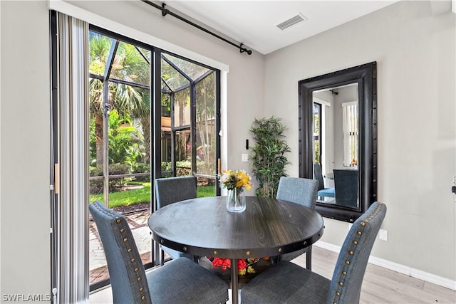 dining room featuring light wood-type flooring