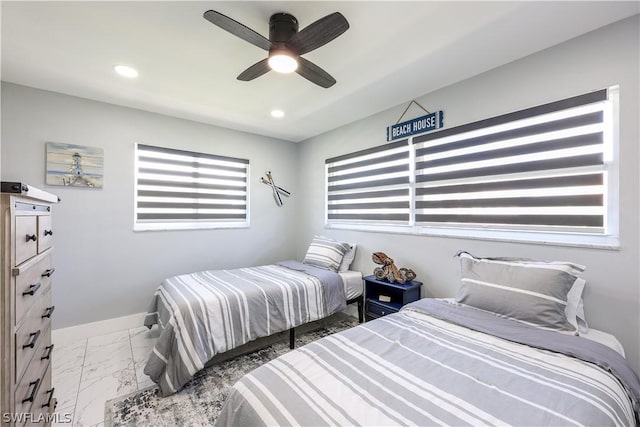 bedroom featuring ceiling fan