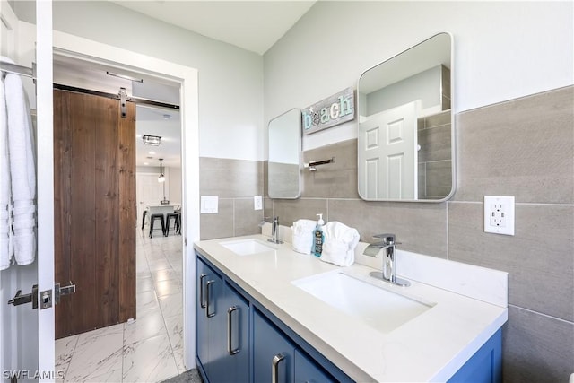 bathroom featuring tile walls and vanity