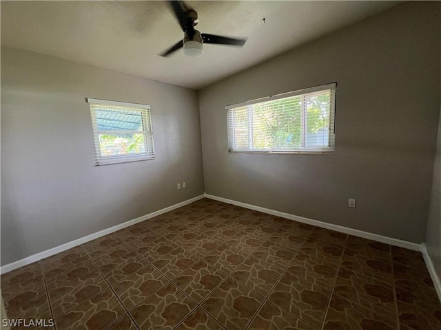 empty room featuring ceiling fan