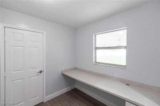 interior space with dark hardwood / wood-style flooring