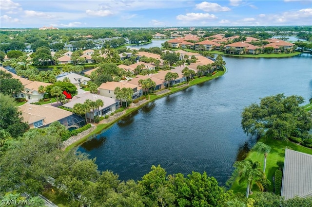 drone / aerial view with a water view