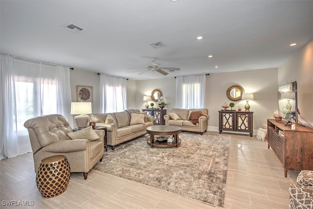 living room with ceiling fan