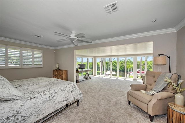 carpeted bedroom featuring ceiling fan, access to outside, and crown molding