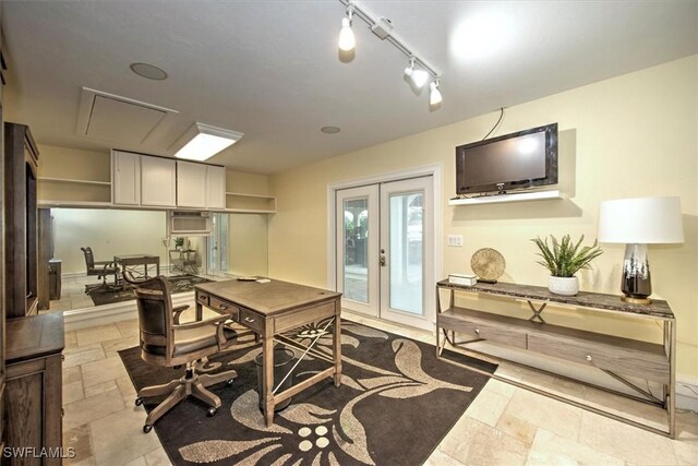 dining room with light tile patterned floors, rail lighting, french doors, and a wall mounted AC