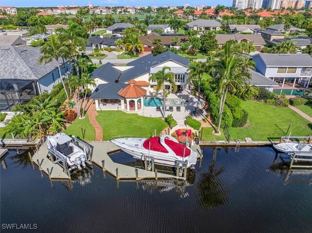 bird's eye view with a water view