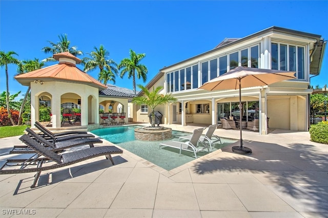 view of swimming pool featuring a patio area