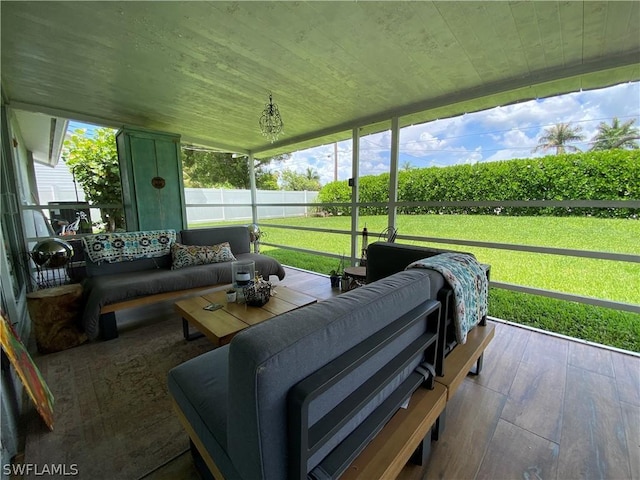 sunroom / solarium with wooden ceiling