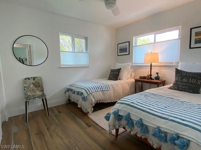 bedroom featuring ceiling fan and wood-type flooring