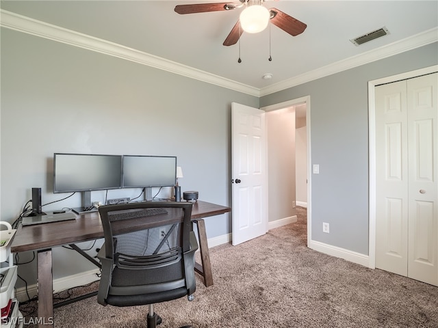 office space featuring ceiling fan, light colored carpet, and ornamental molding