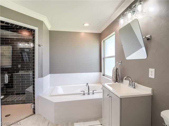 full bathroom featuring vanity, separate shower and tub, crown molding, toilet, and tile patterned floors