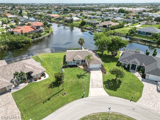 drone / aerial view with a water view