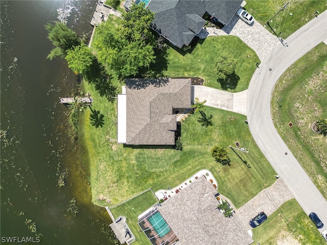 drone / aerial view with a water view