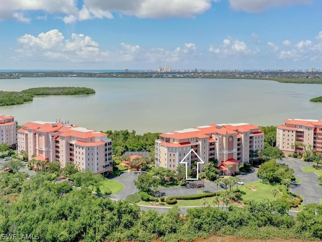 birds eye view of property featuring a water view