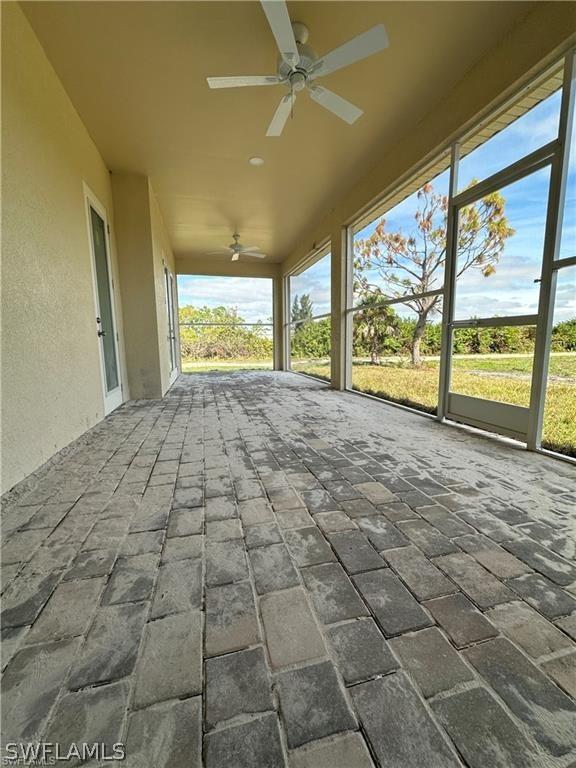 7257 Sweden Blvd, Punta Gorda, FL 33982 - view of patio / terrace featuring ceiling fan and glass enclosure