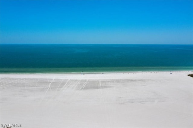 view of water feature with a beach view