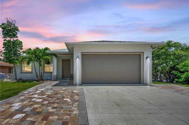 view of front of house with a garage