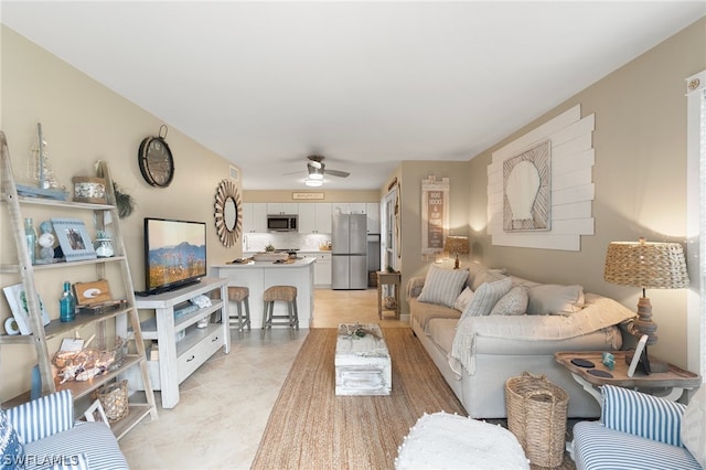 living room with ceiling fan