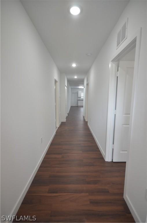 hall featuring dark hardwood / wood-style flooring