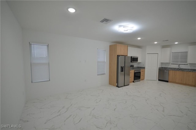 kitchen featuring sink and appliances with stainless steel finishes