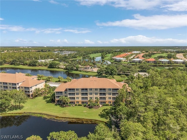 bird's eye view with a water view