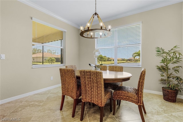 dining room with ornamental molding and an inviting chandelier